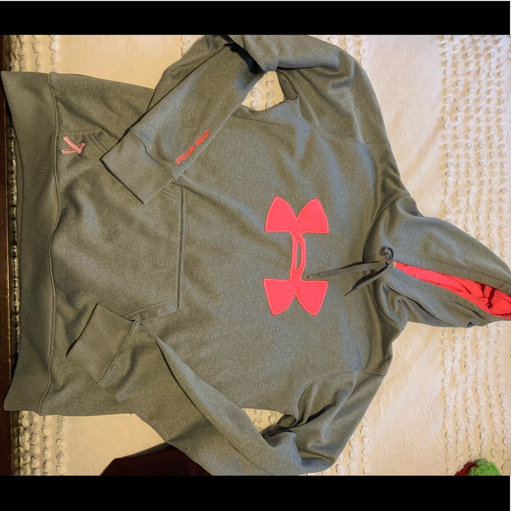 Woman’s breast cancer under armour hoodie